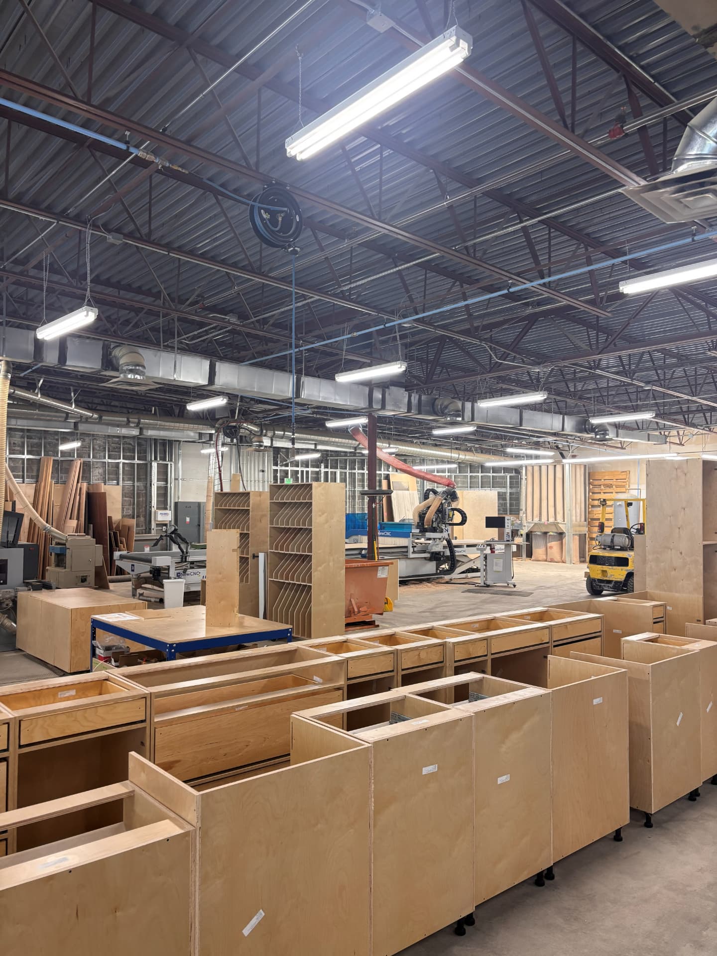 BoxCraft workshop with custom cabinets in production